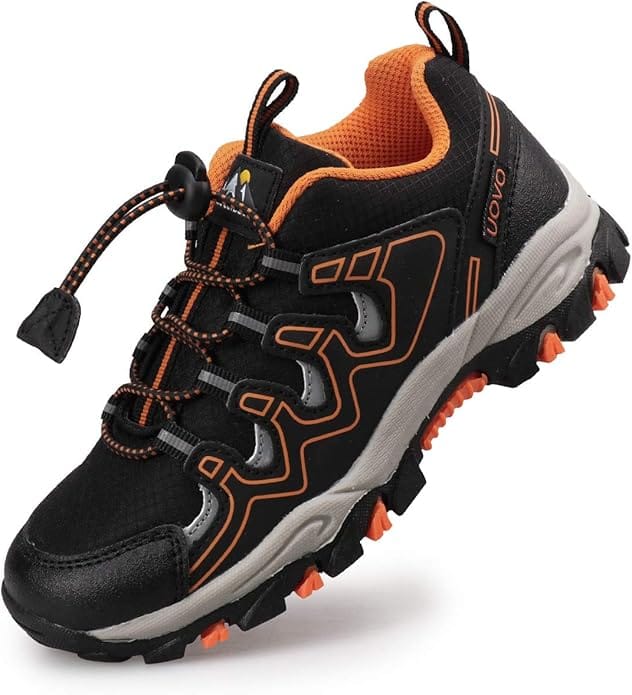 Kids’ black and orange waterproof trekking shoes with rugged soles, designed for outdoor walking and hiking.
